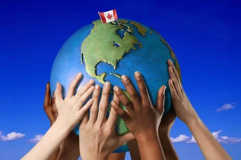 Hands On A Globe Stock Photos