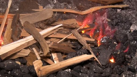 Hands in gloves making fire. Burning coil. Closeup view. Stock Footage 118245413