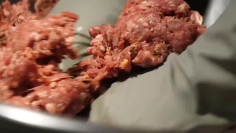 Hands in Gloves Mixing Raw Ground Meat Close-Up Stock-Footage 347689178