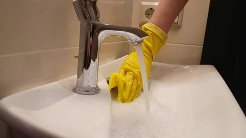 The hands in gloves wash the sink Stock Footage 87945367