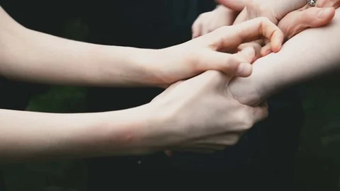 Hands grab each other Stock Footage 81813646