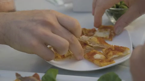 Hands grabbing mini pizza close up, flog shot Stock Footage 169476994