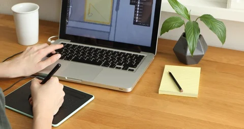 Hands of Graphic designer at work from home Stock-Footage 129524819