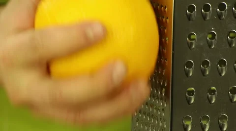 Hands grate orange zest Stock Footage 47981122