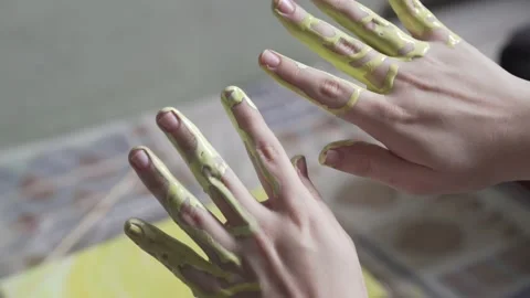Hands with Green Paint Stock-Footage 139265415