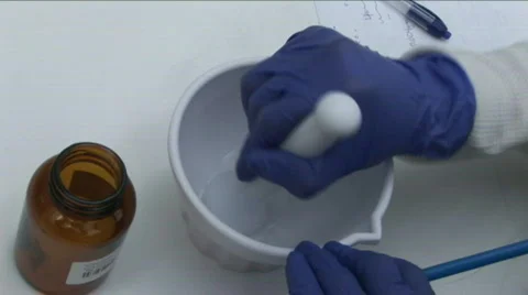 Hands grinding medicines Stock Footage 811905