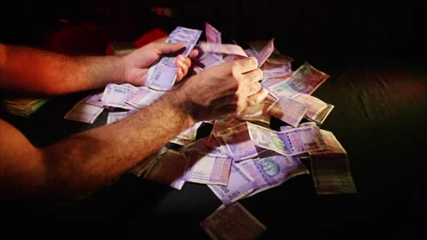 Hands Gripping 100 Rupee Notes in Fast Motion Scene Stock Footage 313671092