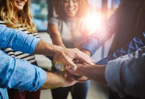 Hands, group and stack at office with support, solidarity or goals with Foto stock
