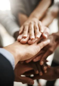 Hands of group of corporate business people in unity for motivation, success and Stock Photos
