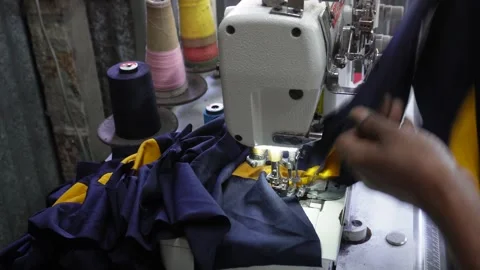 Hands Guiding Fabric Through Sewing Machine Stock-Footage 326151203
