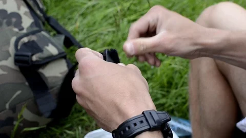 The hands of the guy close up wear fastex belt Stock-Footage 74170482