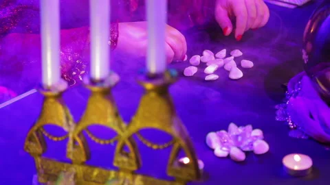 Hands gypsy laying on the table white pebbles Stock Footage 103222618