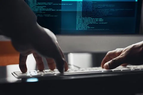 Hands, hacker and typing on computer for programming, data breach or cyber Stock Photos