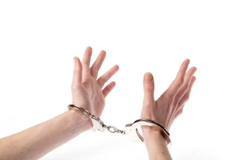 Hands in handcuffs Stock Photos