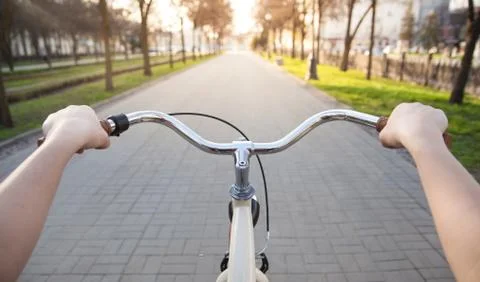 Hands on the handlebars on the mall Stock Photos