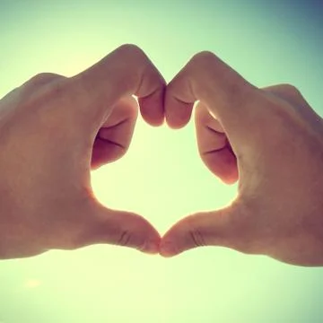 Hands in Heart Shape Foto stock