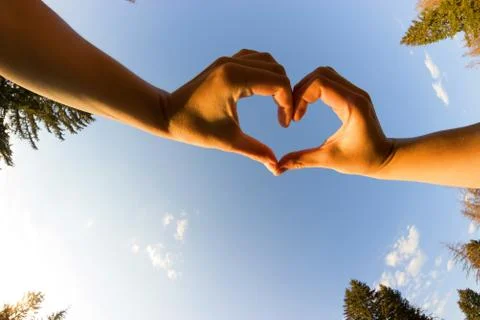 Hands in a hearth shape Stock Photos