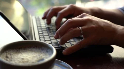 Hands to hit the keyboard at the cafe Stock Footage 150212315