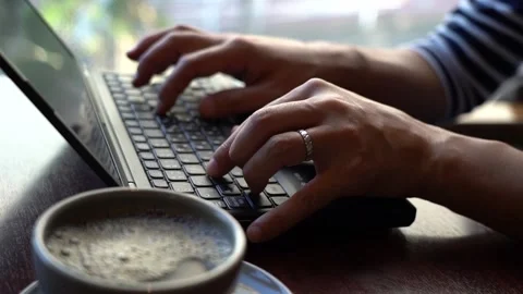 Hands to hit the keyboard at the cafe Stock Footage 150212515