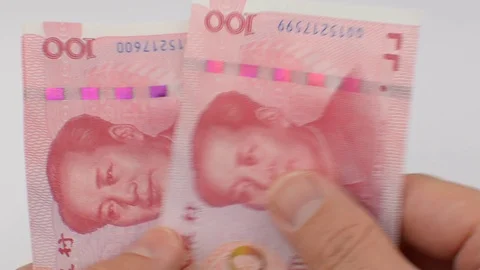 Hands hold and count the Chinese 100 yuan bills. Stock Footage 115452082