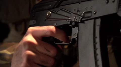 Hands hold an automatic rifle and shoot Video stock 58216538