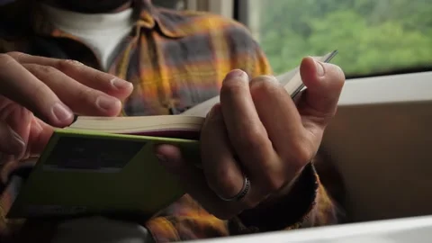 Hands hold book Stock-Footage 157878501