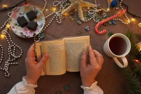 The hands hold the book Stock Photos
