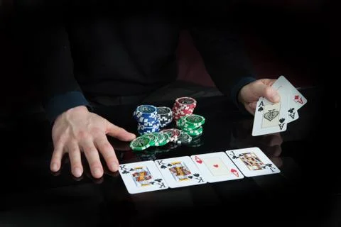 Hands hold the cards Stock Photos