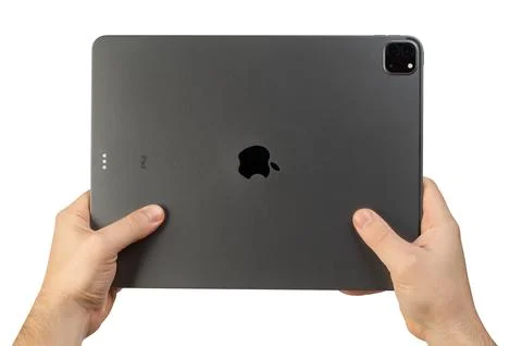 Hands hold  gray ipad pro Stock Photos
