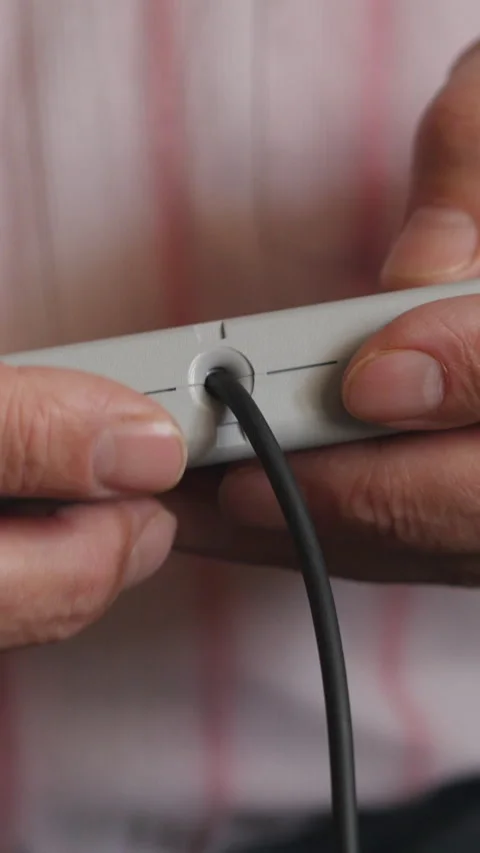 Hands Hold Grey Game Controller With Buttons. Vertical. Stock Footage 305383468