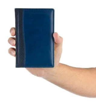 Hands hold a notebook on white Stock Photos