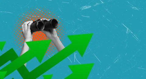 Hands hold a pair of binoculars against a bright blue background. Green arrow Stock Photos