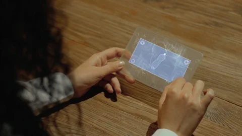 Hands hold tablet with bottle Stock Footage 116243910