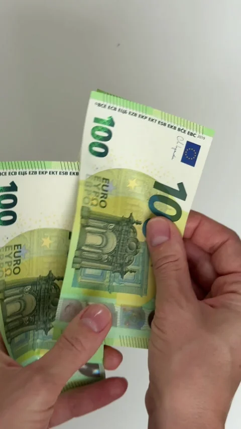Hands Holding and Counting Euro Banknotes Close Up Stock Footage 340650037
