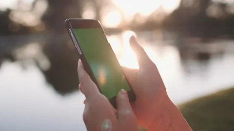 Hands holding and using business smartphone CHROMA KEY. SLOW MOTION 120 fps 4K. Video stock 65405416