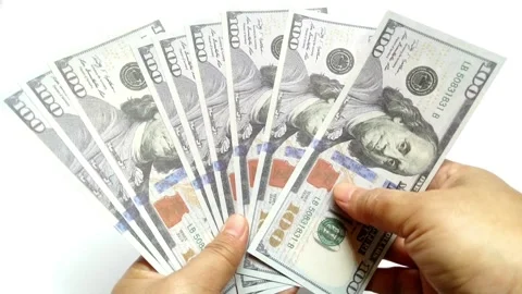 Hands holding assorted United States Dollar Bills Stock Footage 321024198