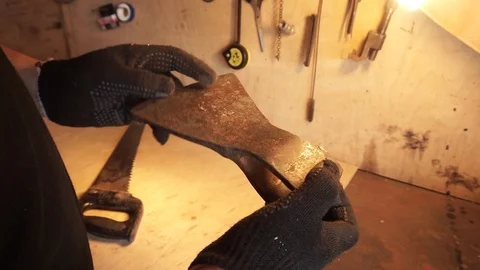 Hands holding an ax Stock Footage 101478061