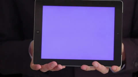 Hands holding bluescreen tablet Stock Footage 40960441
