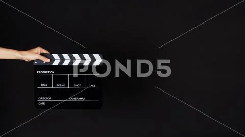 Hand's holding Clapperboard or movie slate use in video production ,film, cin Stock-Fotos