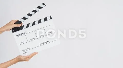 Hands is holding Clapperboard or movie slate. it use in video production ,film Stock-Fotos