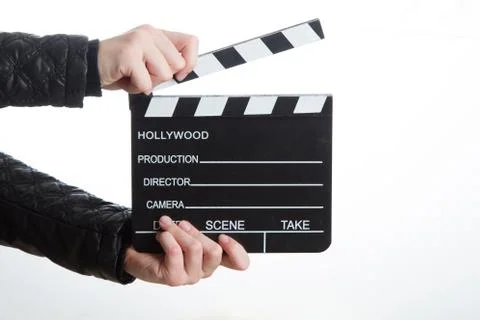 Hands holding clapperboard Stock Photos