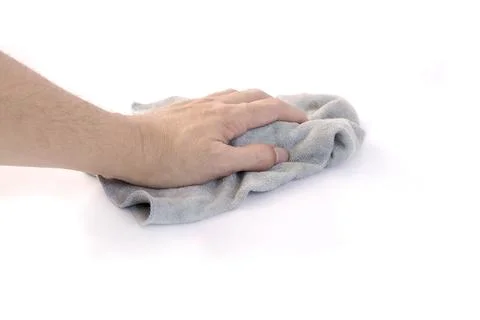 Hands holding cleaning rag microfiber cloth isolated on white background Stock Photos