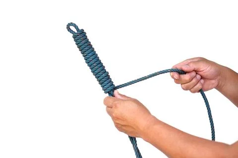 Hands holding coiled rope with loop knot isolated on white background. Nautical  Stock Photos