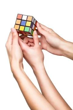 Hands holding color cube Stock Photos