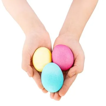 Hands holding colored painted easter eggs Foto stock