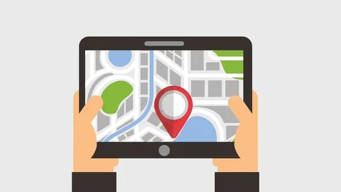 Hands holding device with navigation pointer map Stock Footage 87041440