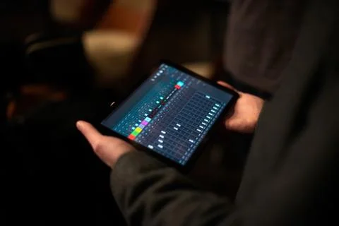 Hands holding digital tablet computer. Top view Stock Photos