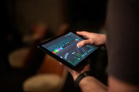 Hands holding digital tablet computer. Top view Stock Photos