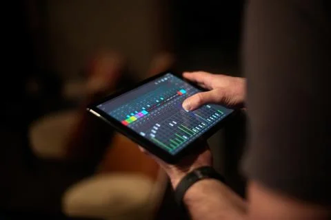 Hands holding digital tablet computer. Top view Stock Photos