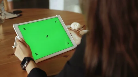 Hands Holding Digital Tablet With Green Screen At Breakfast circa 2015 4k Stock Footage 72394800